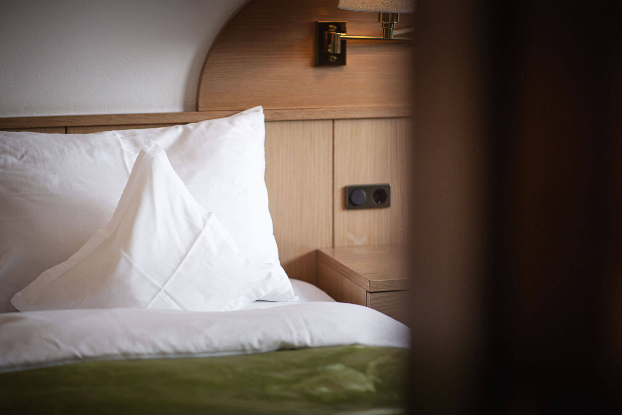 Bett im Hotelzimmer Neves - Hotel Mühlwald