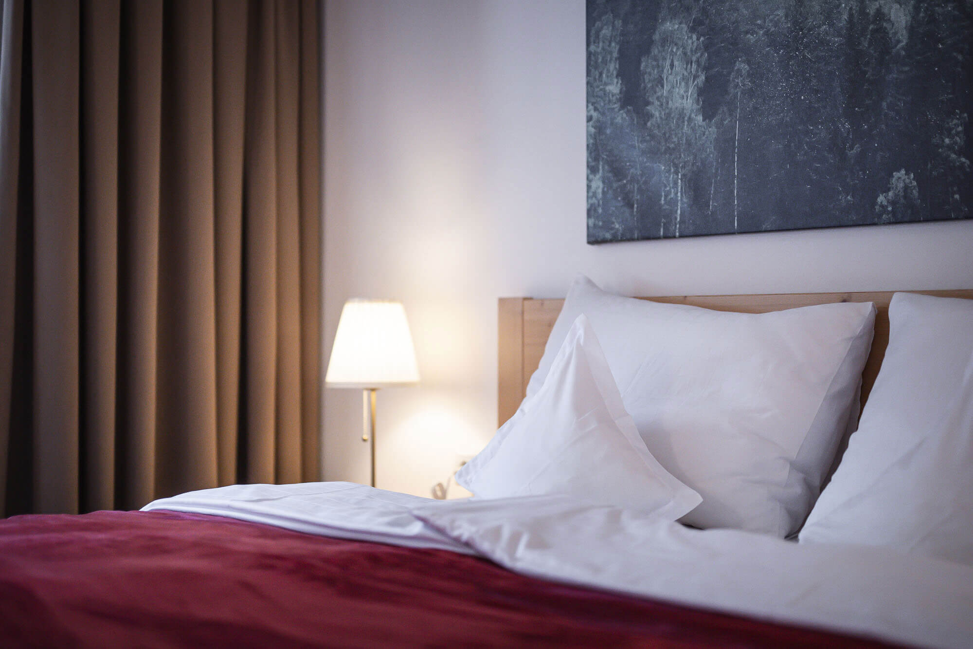 Doppelbett im Hotelzimmer Zösen - Hotel Mühlwald